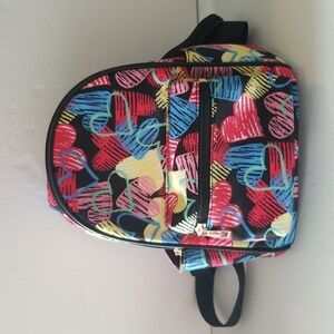 Mini‎ backpack with multicolored hearts.